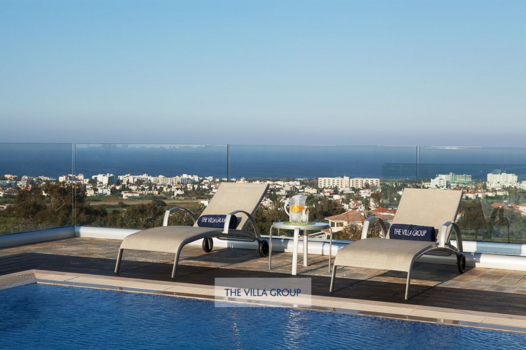 Plenty of sunbeds surrounding the private pool