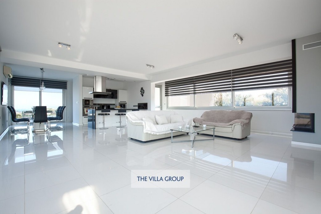 Open plan living area with direct access to the pool