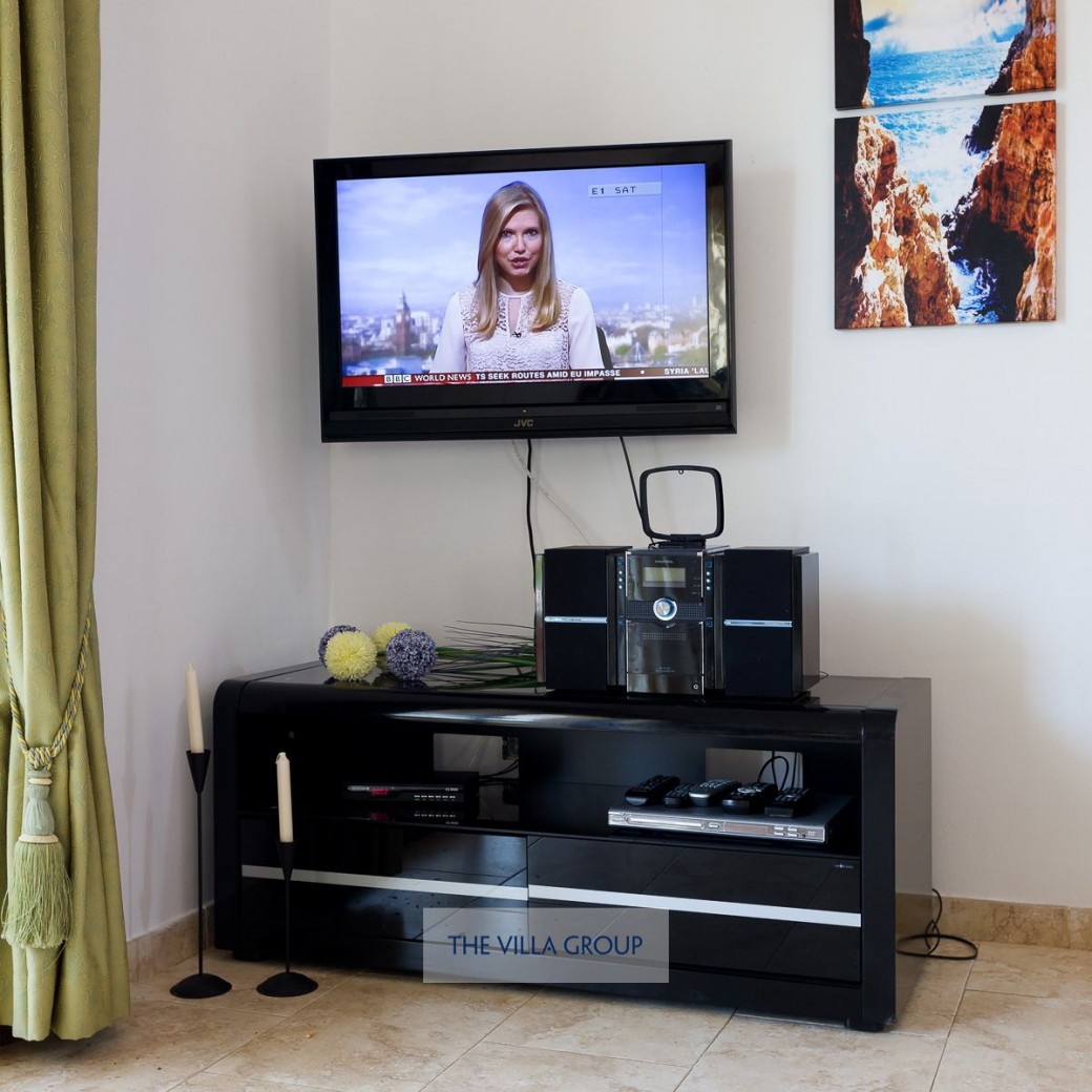 TV with satellite channels, DVD and CD player