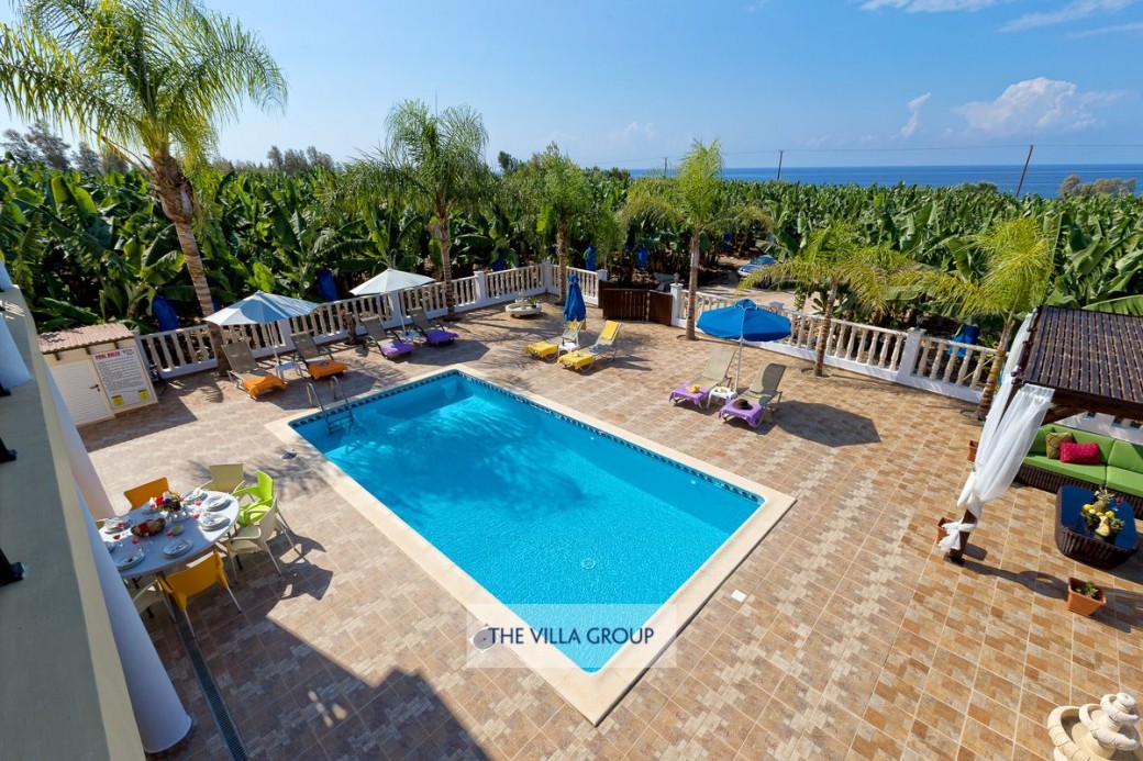 View of the swimming pool from the first floor balcony
