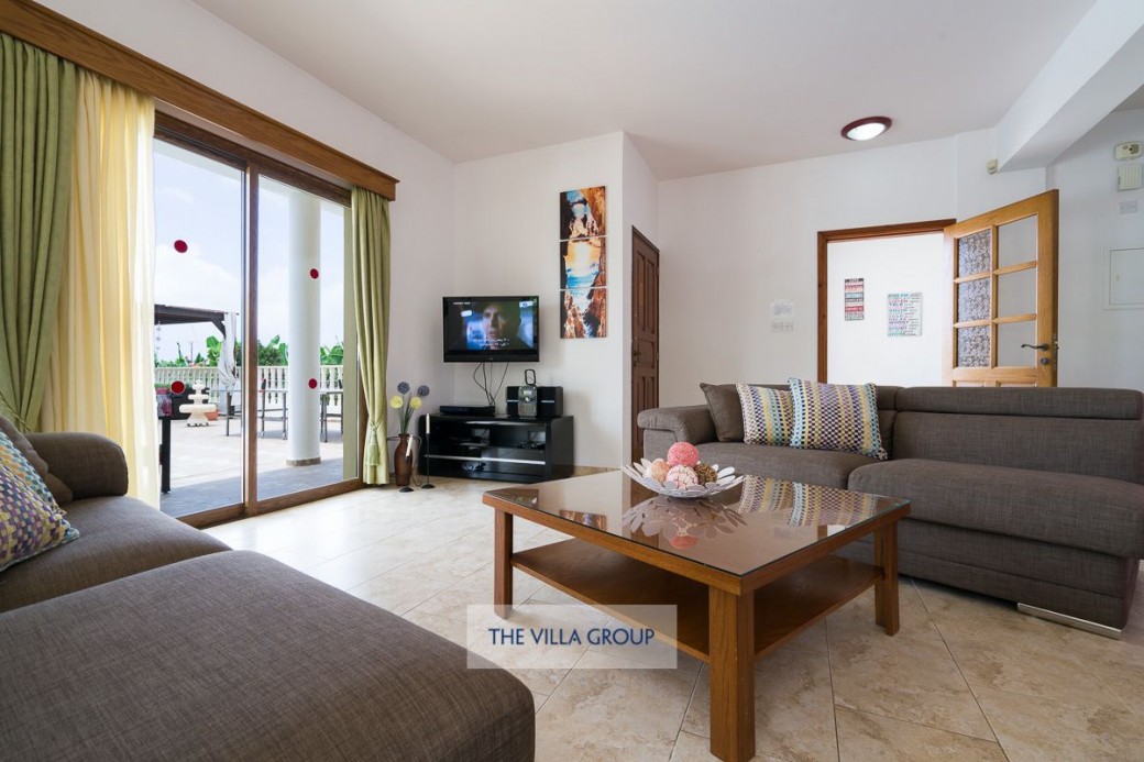 Living area with comfortable sofas and TV