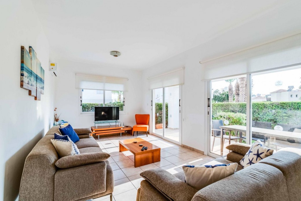 Spacious living room with patio doors to terrace