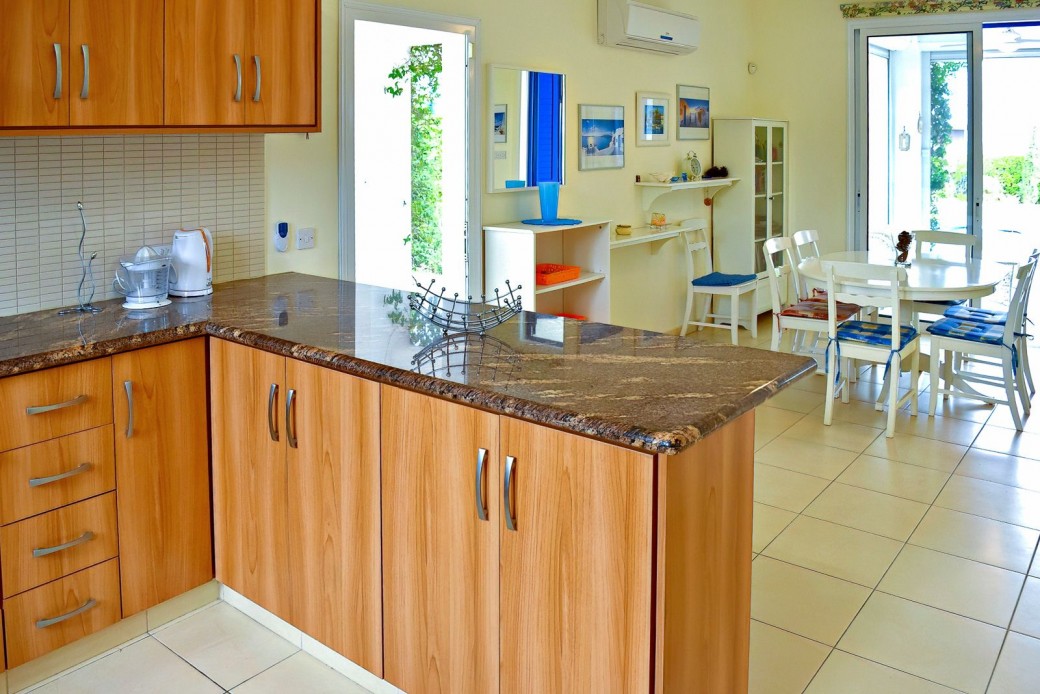 Kitchen adjacent to dining area