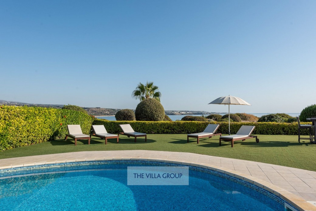 Private 8m x 4m kidney shaped swimming pool (depths 1m x 1.90m)