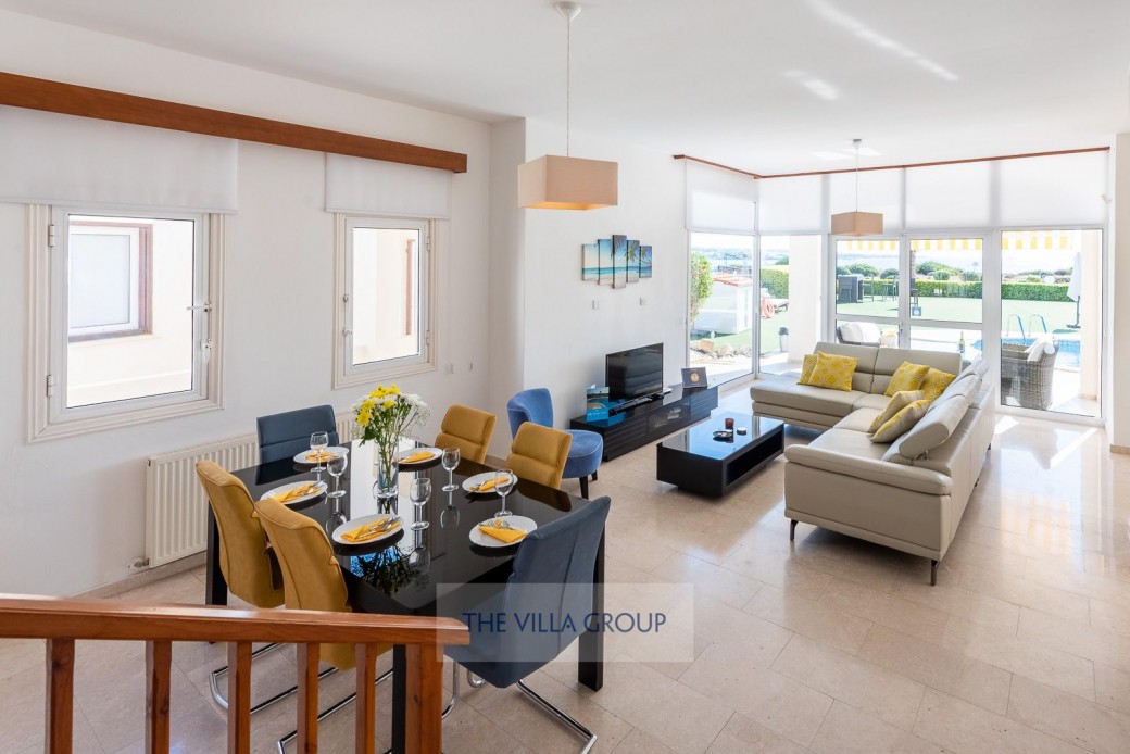 Stairs leading to the open-plan living and dining area