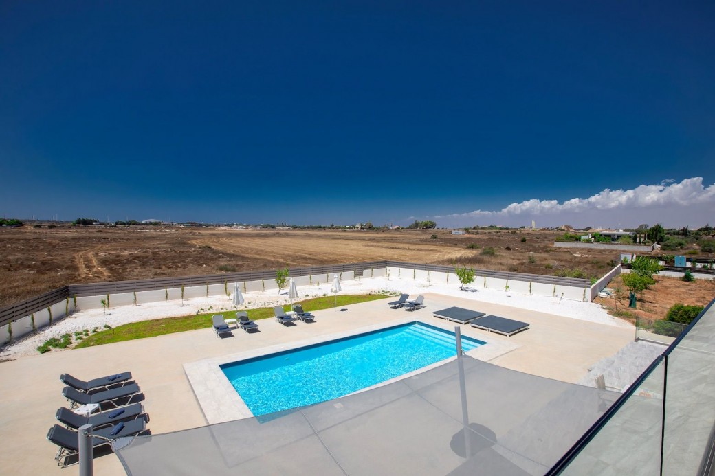 View over the swimming pool from the first floor balcony