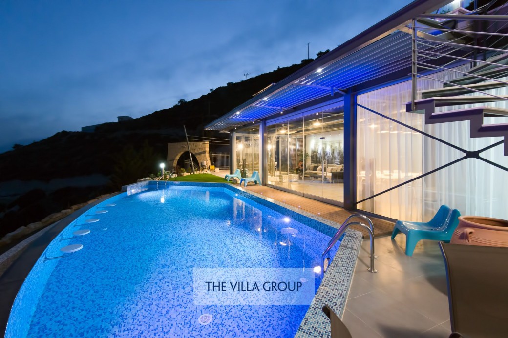 Villa lit during the evening