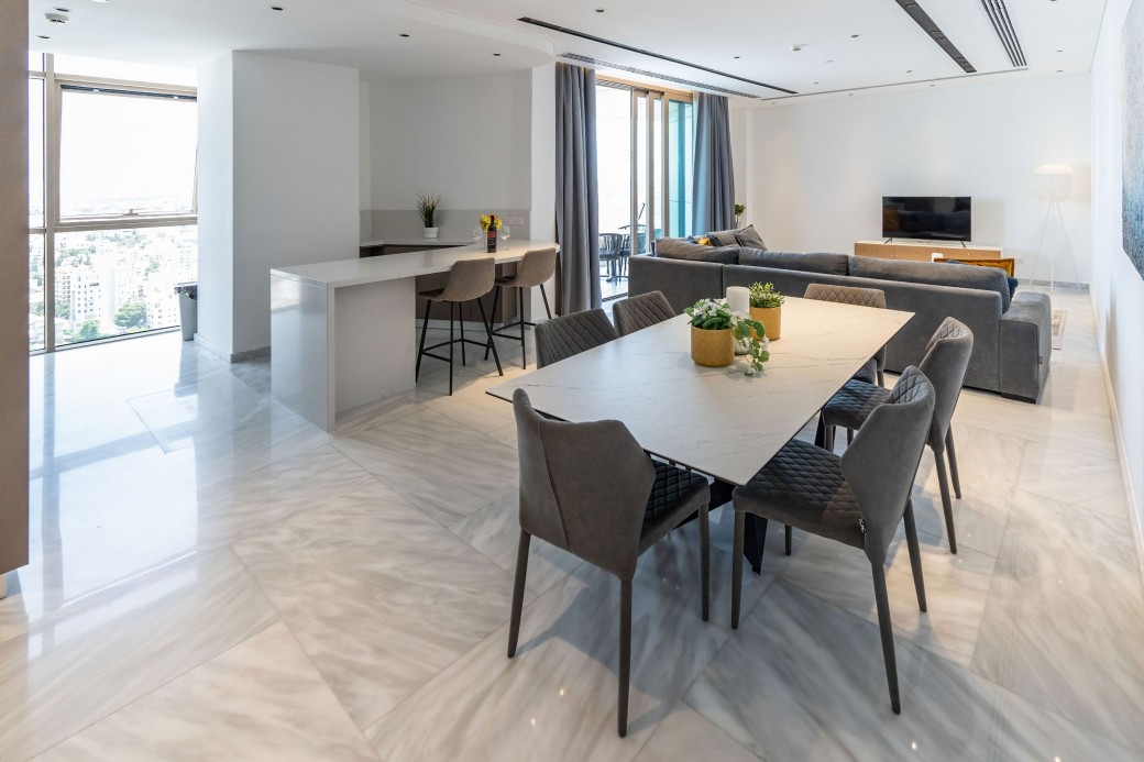 Open plan living, dining and kitchen areas