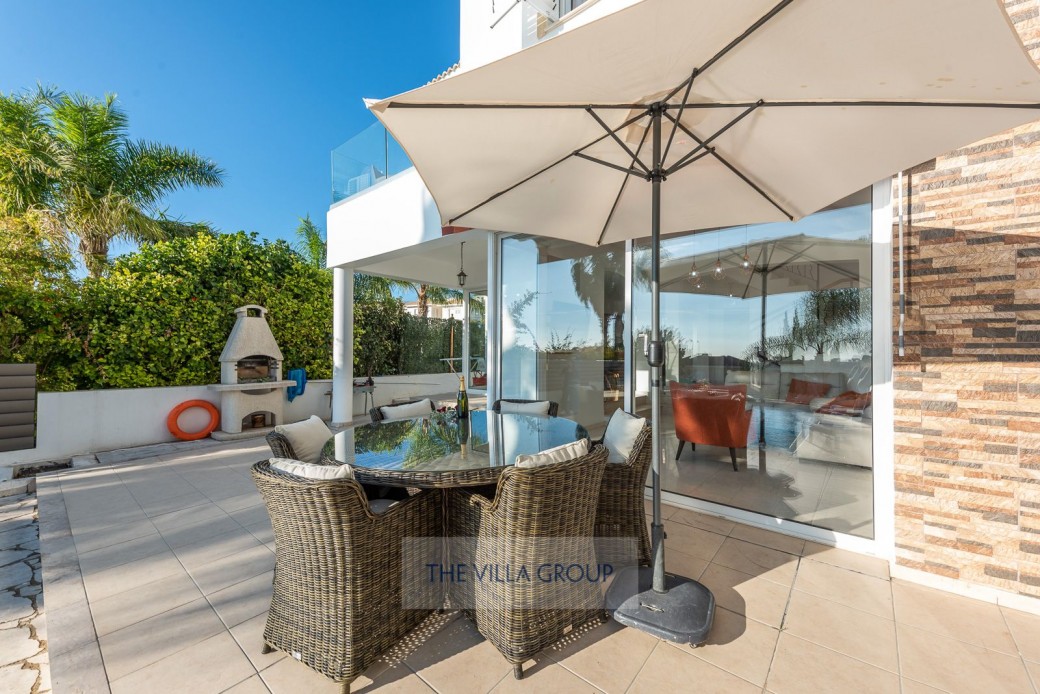Barbecue and outside furniture set the scene for alfresco dining