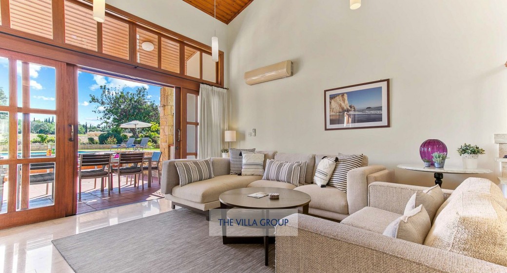 Large open plan living area with french doors that open out onto the rear terrace