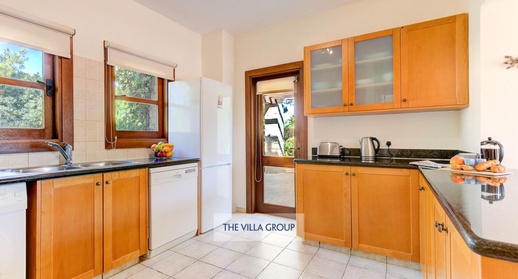 The villa also provides a well-designed and equipped family kitchen.