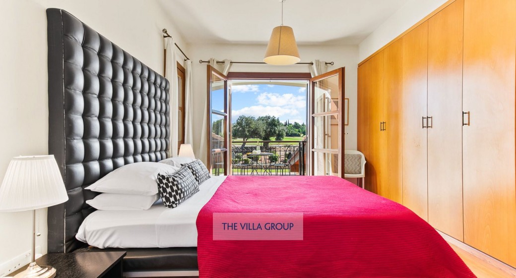 Balcony which overlooks the pool, garden and golf course