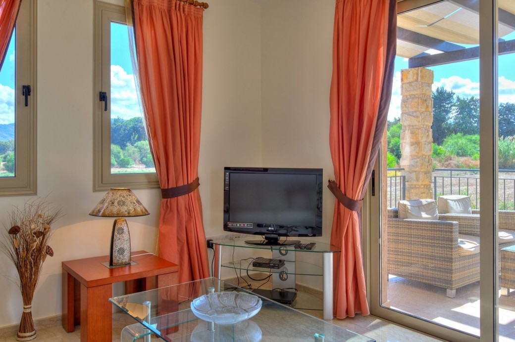 Patio doors from living area to furnished terrace
