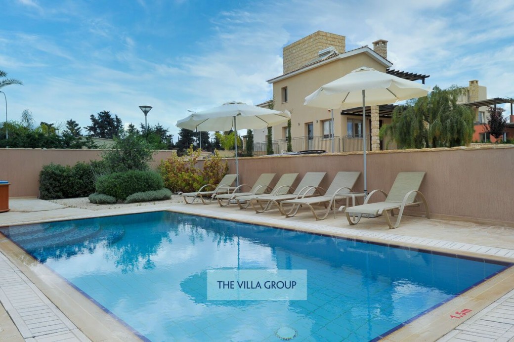 Sunbeds surround the pool for relaxing under the Cyprus sunshine