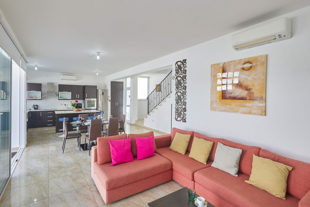 Open plan living, dining and kitchen areas