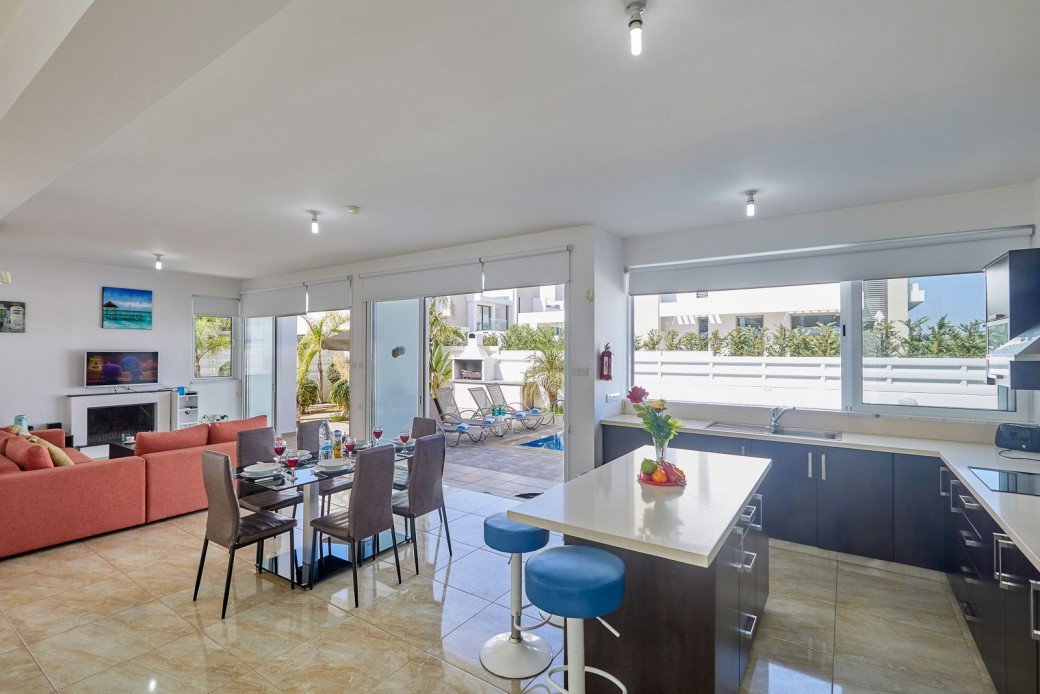 Doors from living area lead to outside terrace