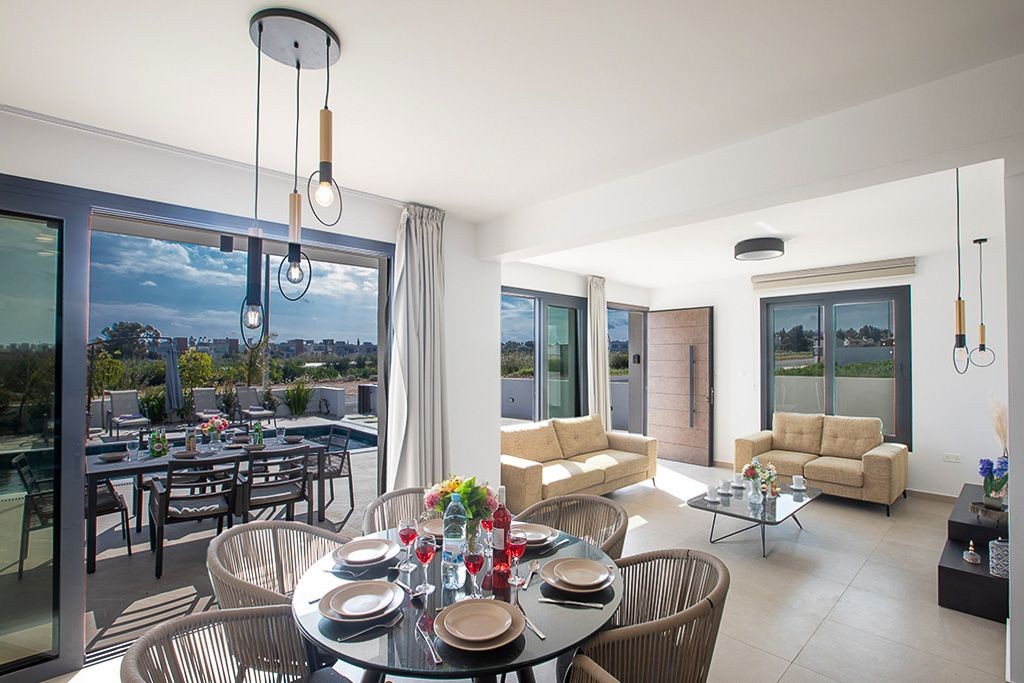 Open plan living, dining and kitchen areas