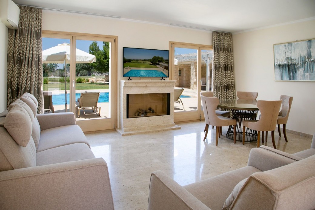 Patio doors from the living area lead to the terrace
