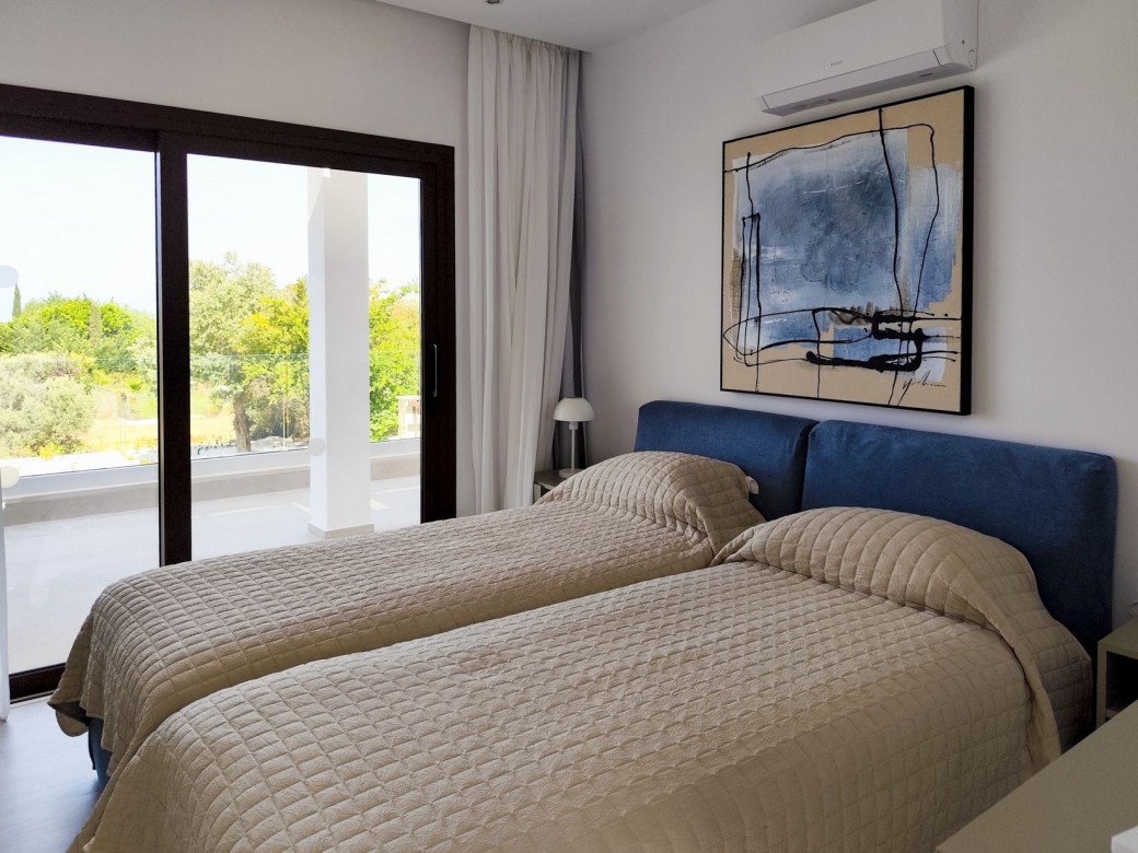 Twin beds that can be easily converted into double beds, upon request, using the zip and lock system
