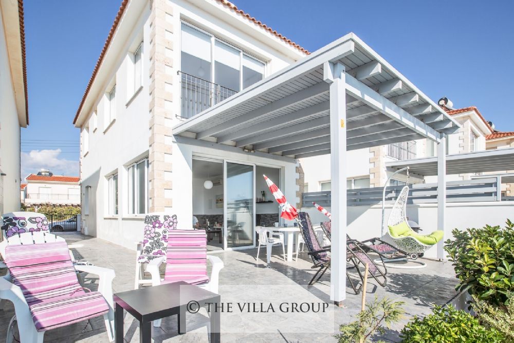 Covered terrace with patio table