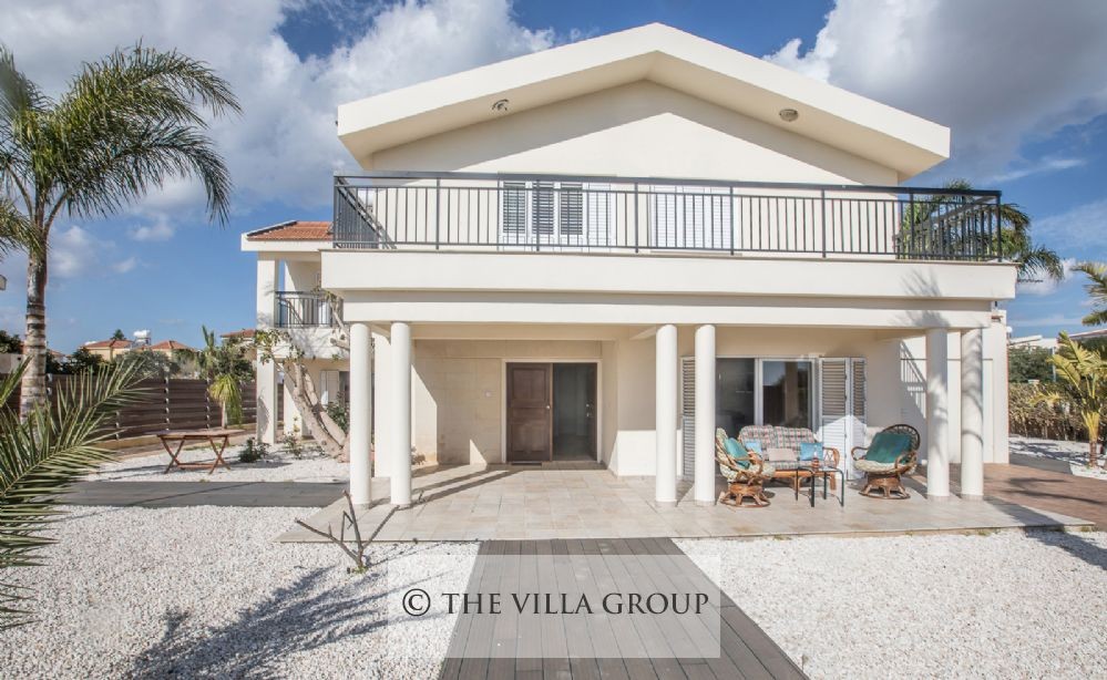 Entrance to the villa with outside relaxing seating area