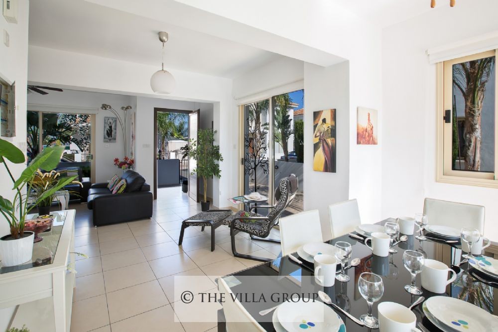 Dining and living area with entrance