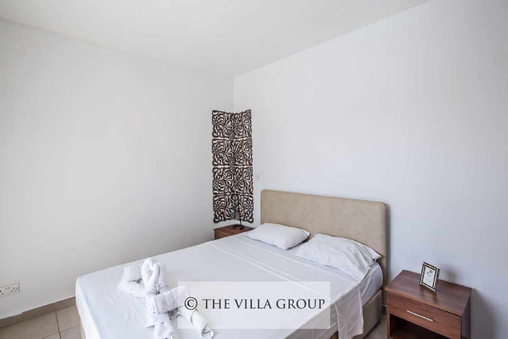 Main bedroom with a double bed