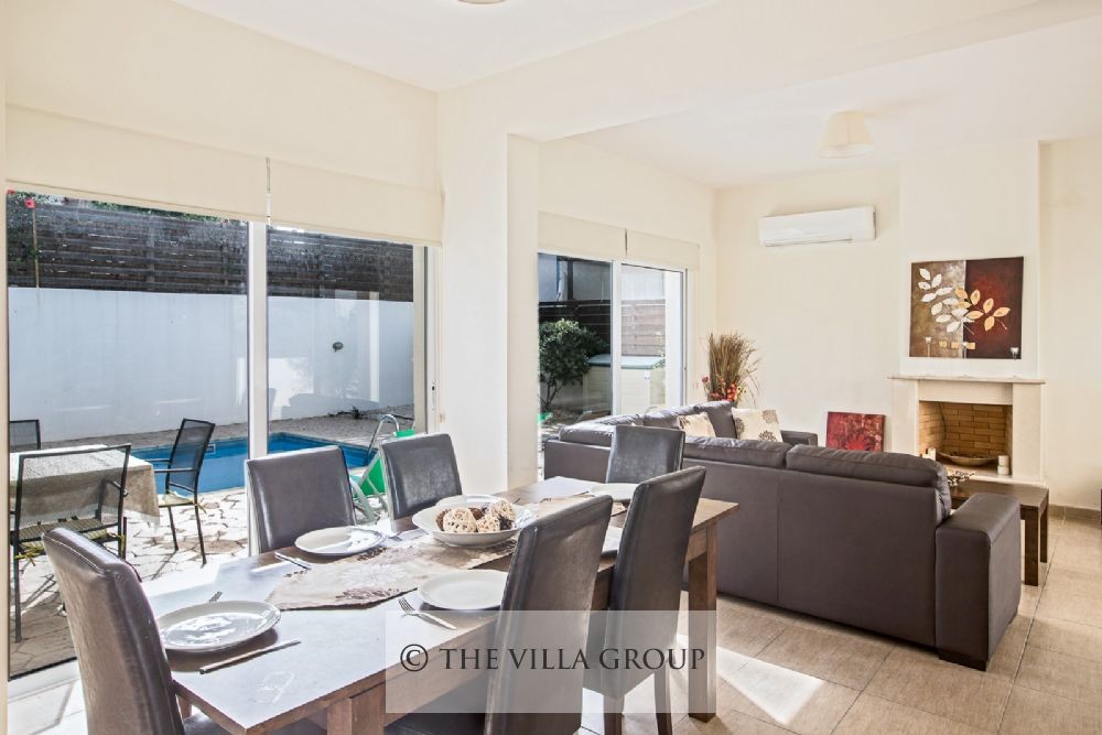 Dining and living area with direct access to the swimming pool