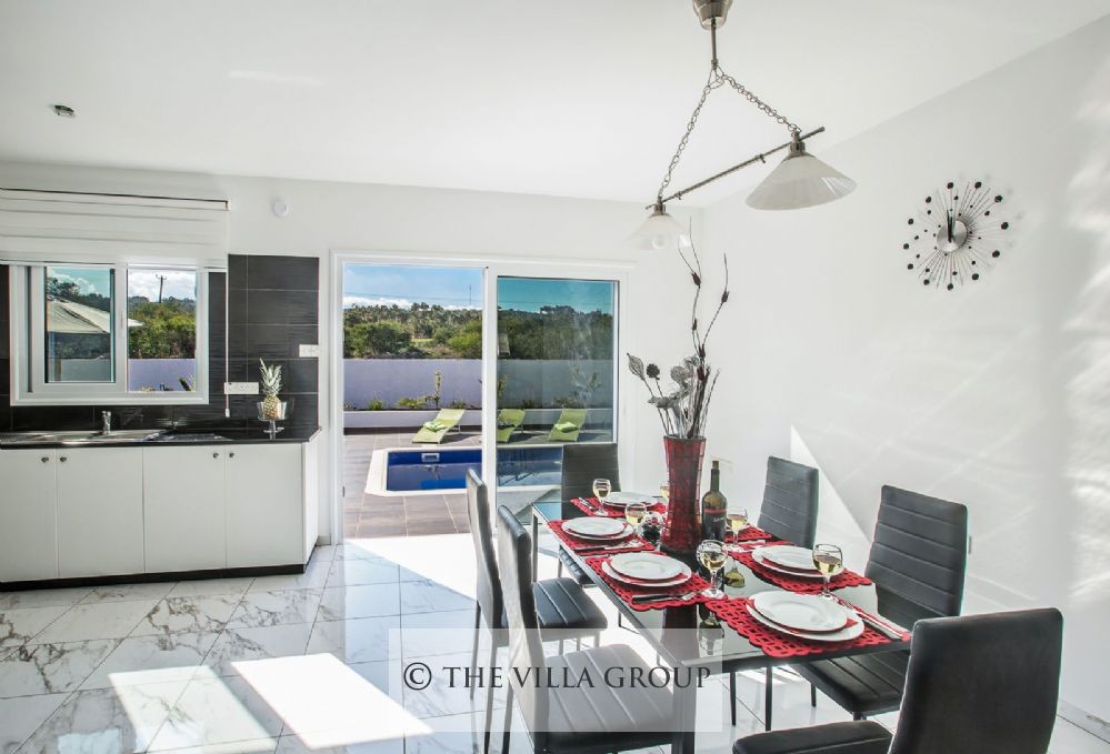 Patio doors leading to the swimming pool