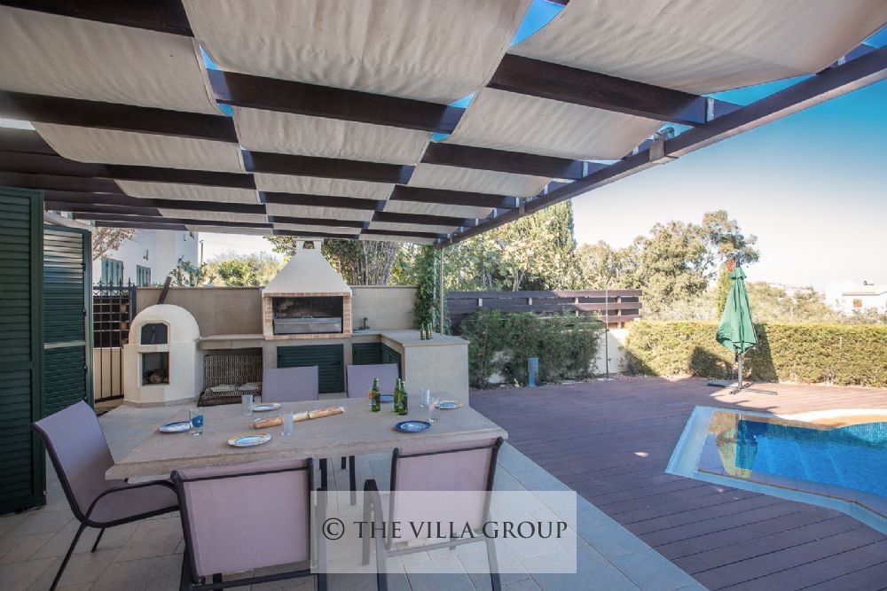 Outside dining furniture with fixed barbecue