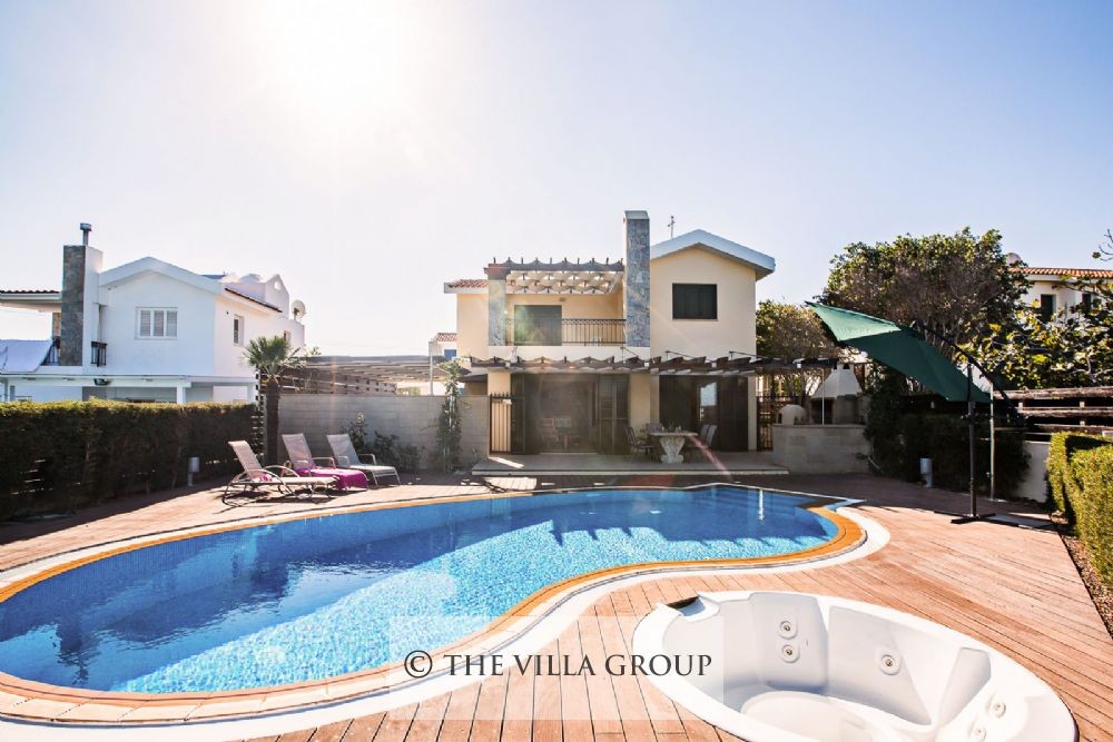Swimming pool with a hot tub