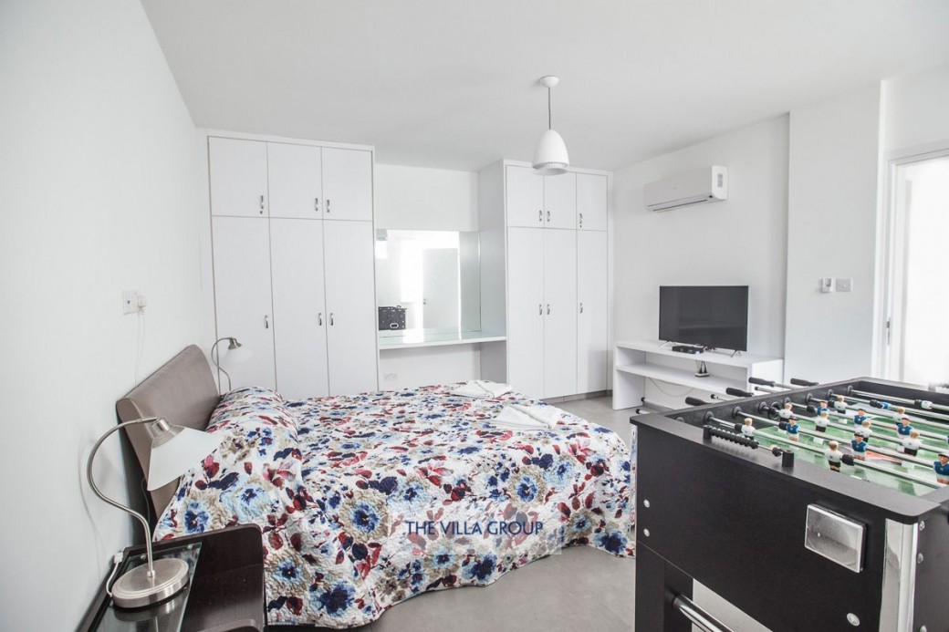 Lower ground floor double bedroom with flat screen TV