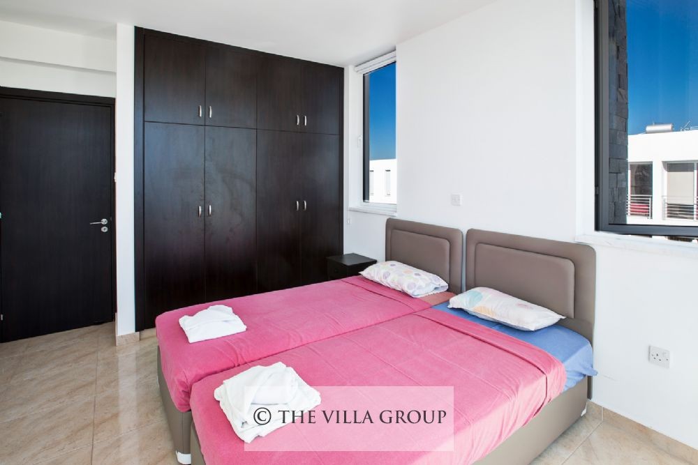 First bedroom with twin beds
