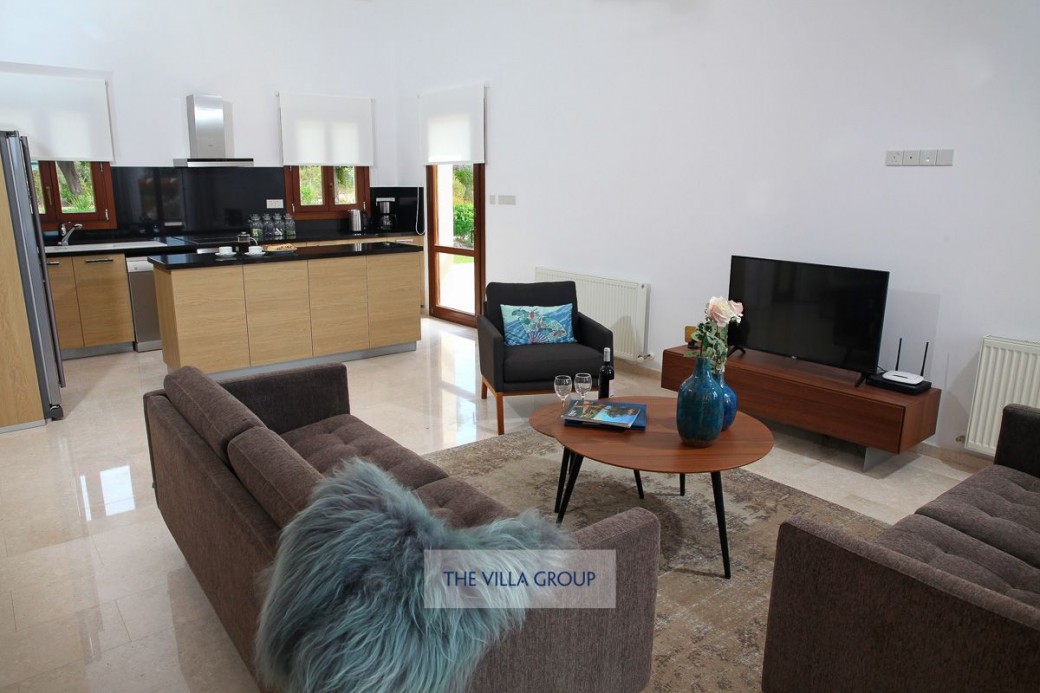 Open plan living, dining and kitchen areas