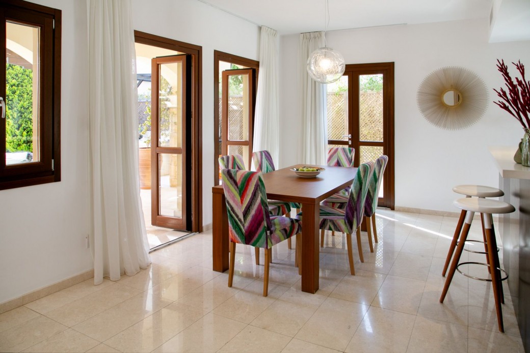 French doors unveiling the captivating pool terrace