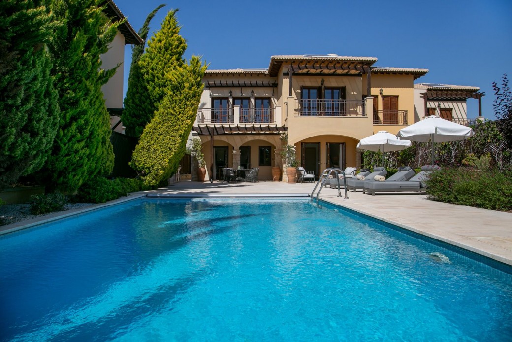 The villa boasts a prime location with breathtaking sea vistas, just moments away from the vibrant heart of the resort