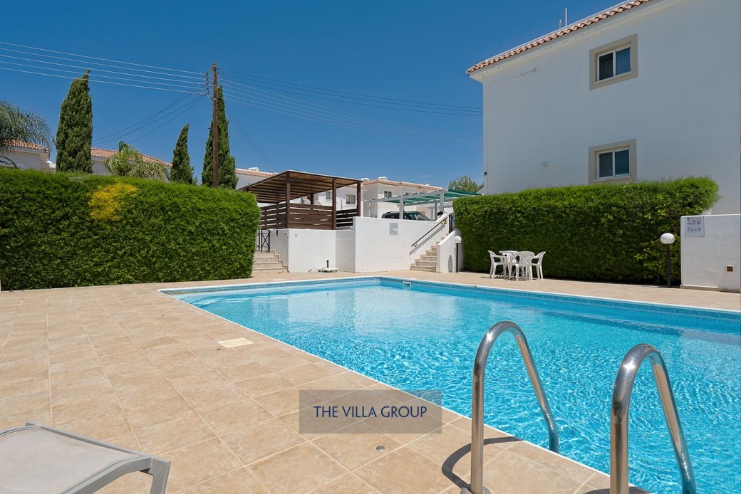 Swimming pool is a stones throw from the apartment
