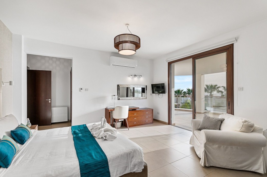 Patio doors lead to large balcony