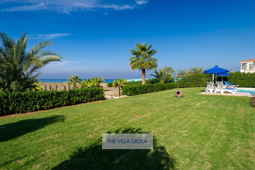 Large outside area with lawn, garden, swimming pool and furnished terrace