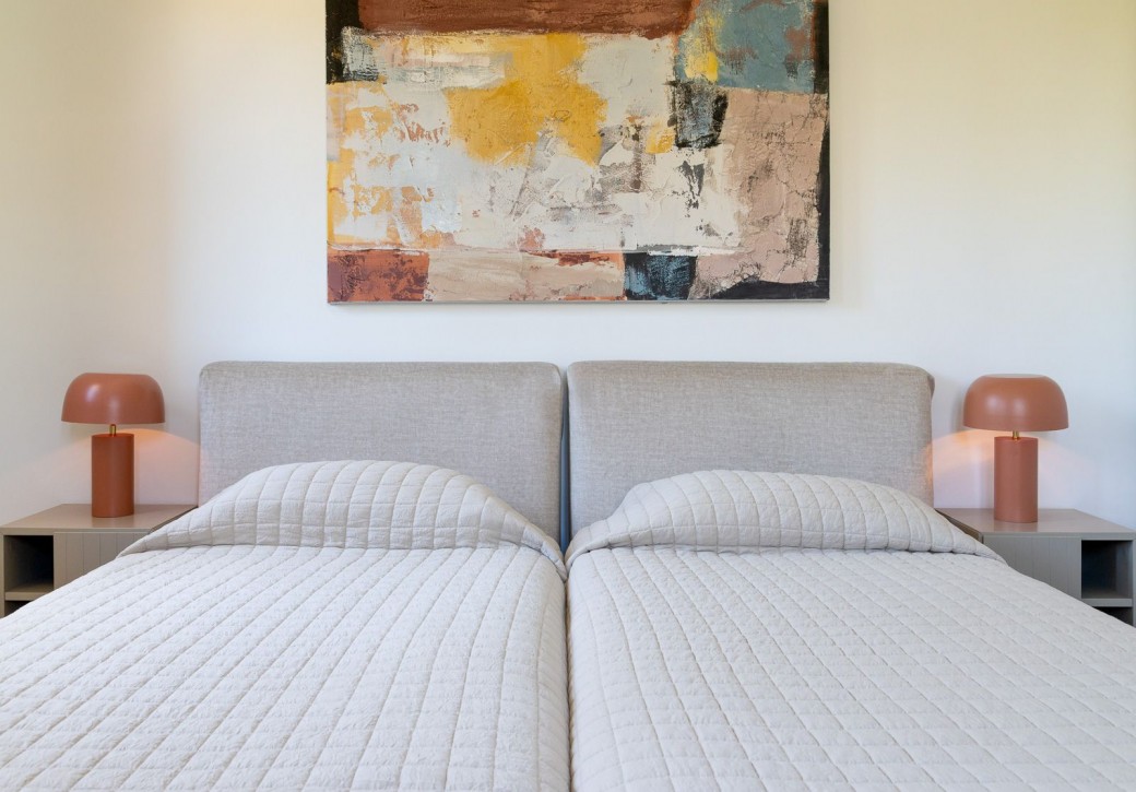 Twin bedroom located on the lower ground floor