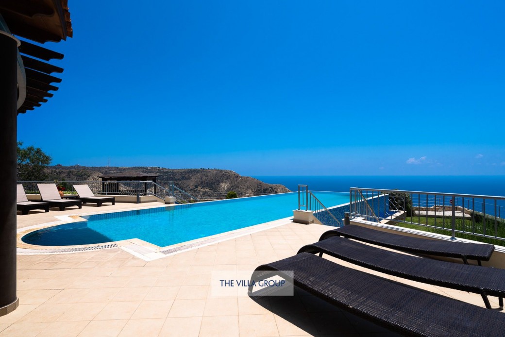 Spacious outside area with plenty of sunbeds for relaxing under the Cyprus sunshine
