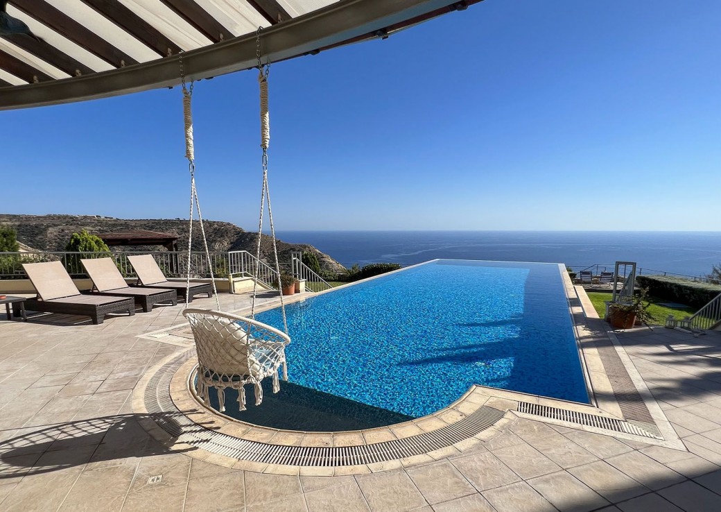Spacious outside area with superb infinity swimming pool